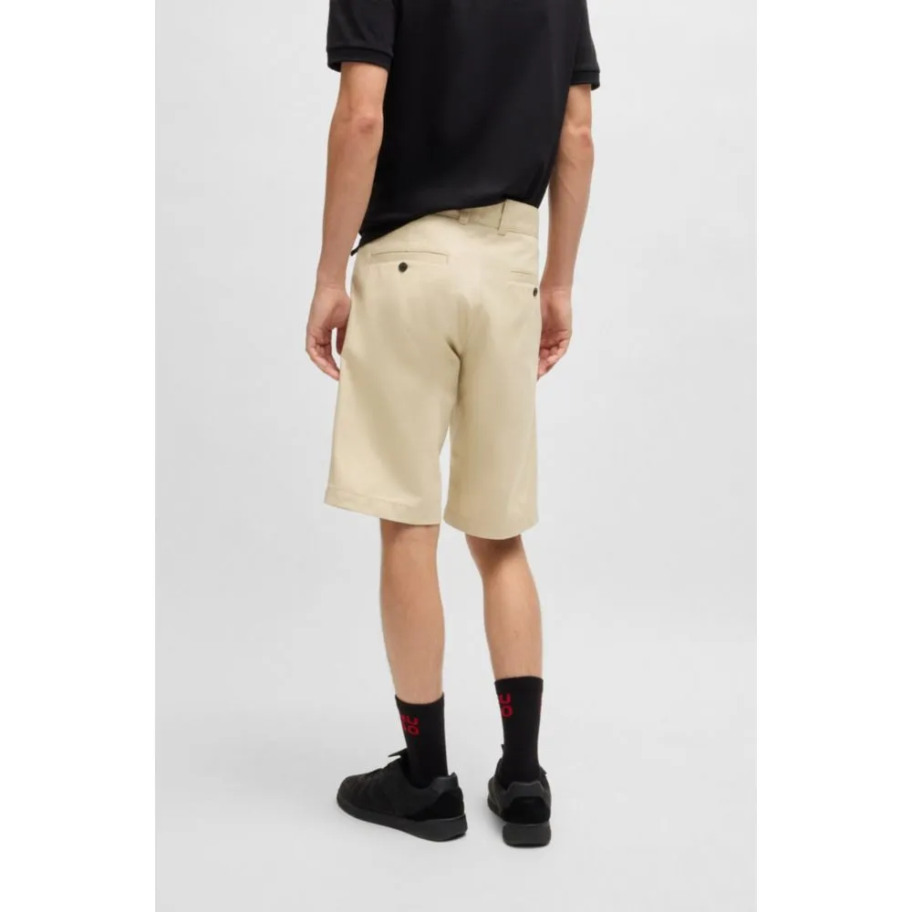Regular-fit shorts with slim leg and buttoned pockets