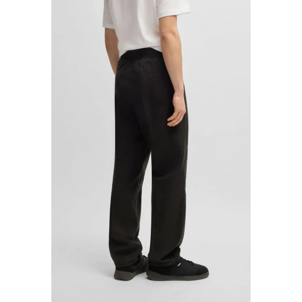 Tapered-fit tracksuit bottoms in ripstop cotton