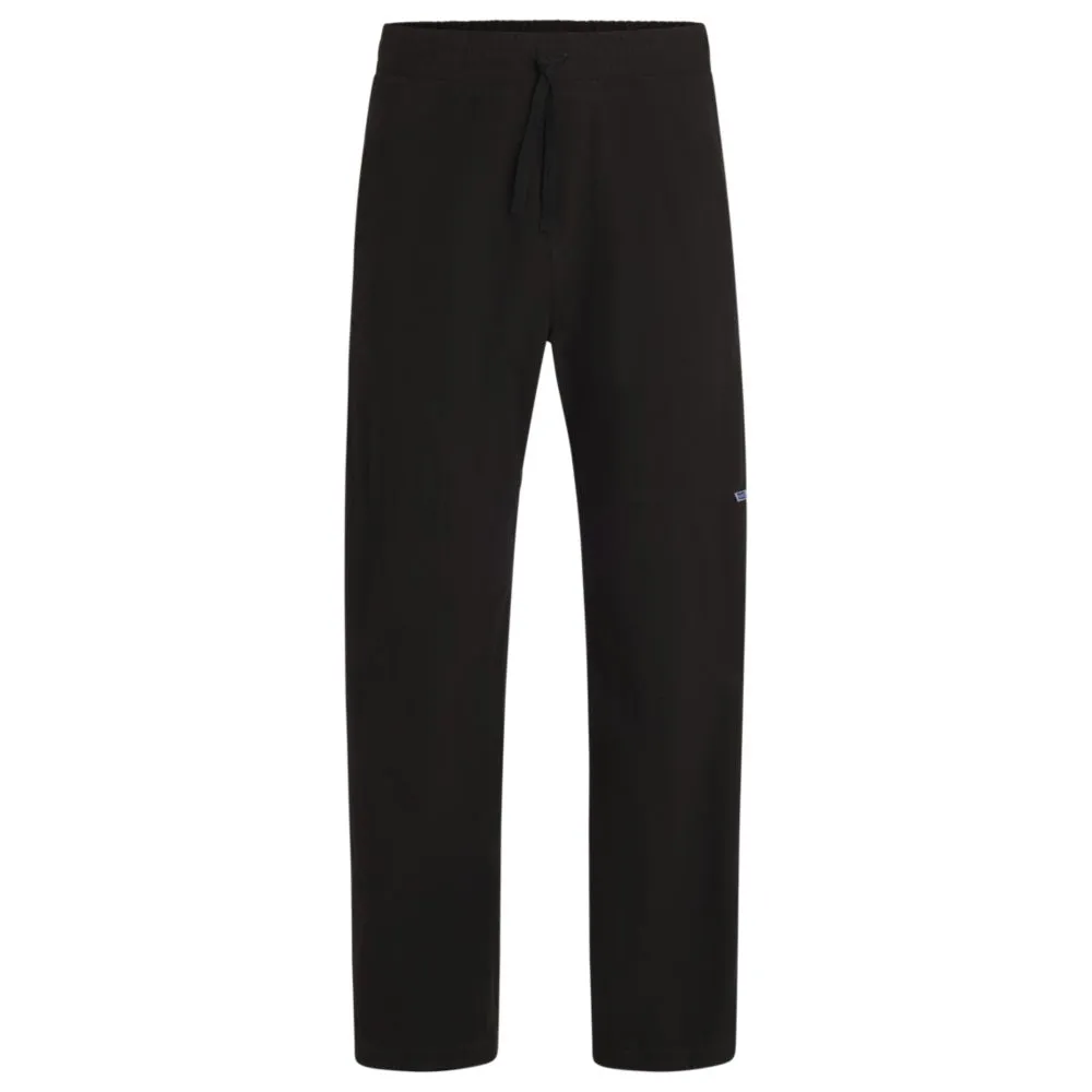 Tapered-fit tracksuit bottoms in ripstop cotton